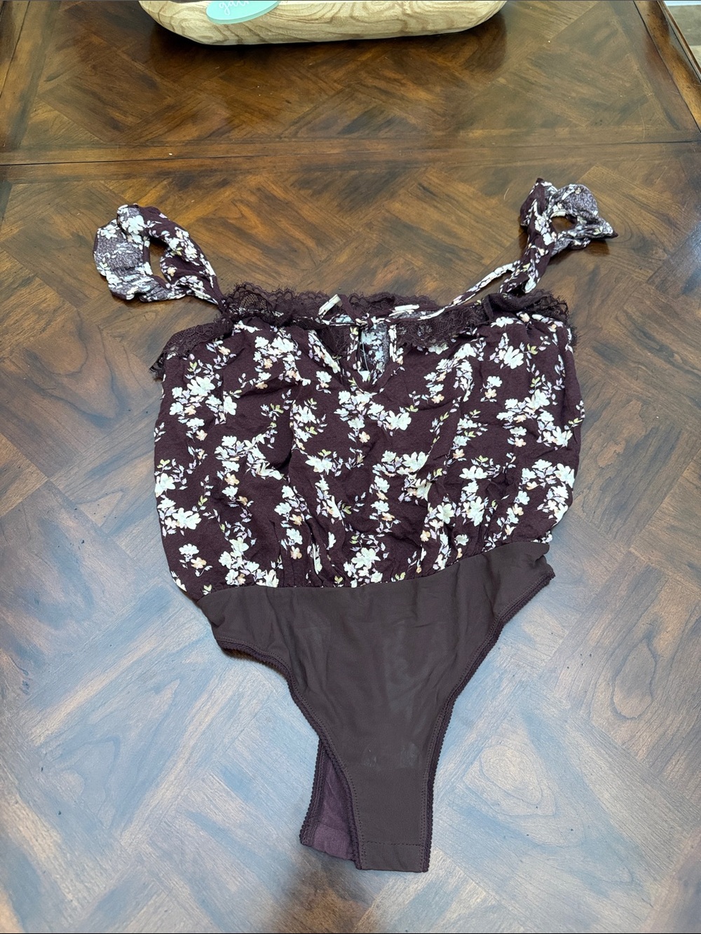 Free People Intimately Floral One-Piece bodysuit in Dark Plum